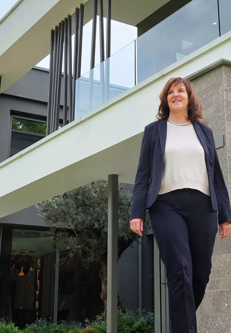 Heidi Weber-Mühleck Managing Partner of WeberHaus in front of Building